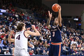 Jan 21, 2026; Spokane, Washington, USA; Pepperdine Waves guard Aaron Clark (3) shoots the ball against Gonzaga Bulldogs guard Davis Fogle (4) in the first half at McCarthey Athletic Center. Mandatory Credit: James Snook-Imagn Images