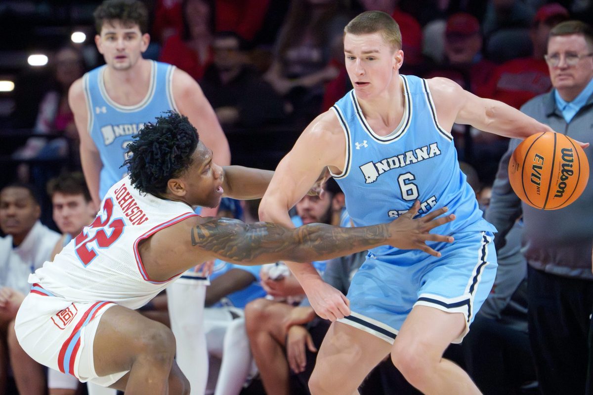 Bradley’s Jaquon Johnson, left, pressures Indiana State’s Jo Van Buggenhout in the second half of their college basketball game Wednesday, Jan. 21, 2026 at Carver Arena. The Braves mounted a last-minute rally to defeat the Sycamores 75-68.