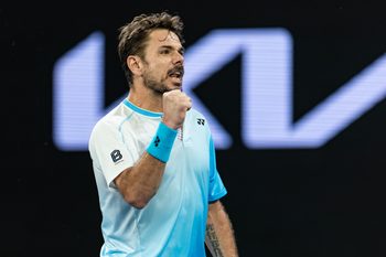 Jan 24, 2026; Melbourne, Victoria, Australia; Stan Wawrinka of Switzerland in action against Taylor Fritz of United States in the third round of the menís singles at the Australian Open at John Cain Arena in Melbourne Park. Mandatory Credit: Mike Frey-Imagn Images