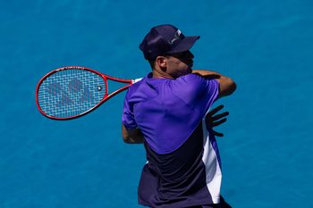 Jan 25, 2026; Melbourne, Victoria, Australia; Tommy Paul of United States in action against Carlos Alcaraz of Spain in the fourth round of the menís singles at the Australian Open at Rod Laver Arena in Melbourne Park. Mandatory Credit: Mike Frey-Imagn Images