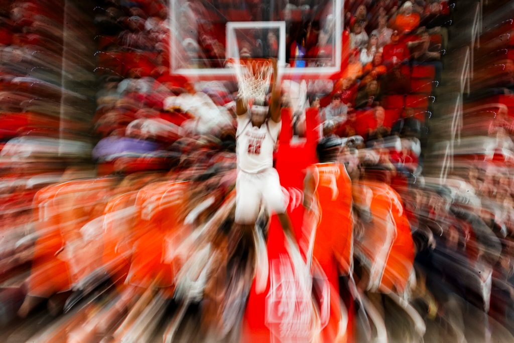 Jan 27, 2026; Raleigh, North Carolina, USA; NC State Wolfpack forward Ven-Allen Lubin (22) dunks the ball during the second half of the game against the Syracuse Orange at Lenovo Center. Mandatory Credit: Jaylynn Nash-Imagn Images