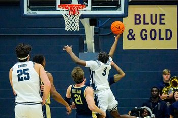 University of Toledo’s Sonny Wilson (3) shoots against Akron, Jan. 27, 2026, at James A Rhodes Arena in Akron, Ohio.