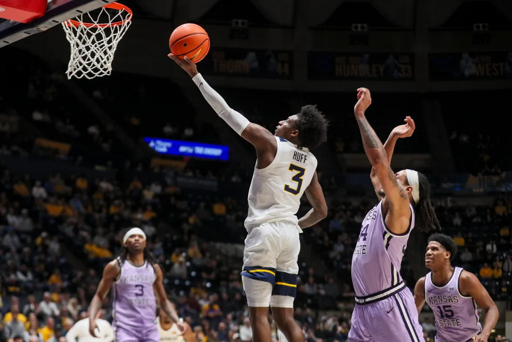 Jan 27, 2026; Morgantown, West Virginia, USA; West Virginia Mountaineers guard Honor Huff (3) drives down the lane and shoots during the second half against the Kansas State Wildcats at Hope Coliseum. Mandatory Credit: Ben Queen-Imagn Imagesa
