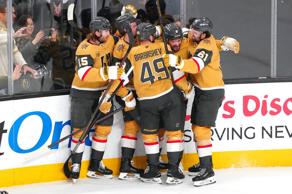 Jan 29, 2026; Las Vegas, Nevada, USA; Vegas Golden Knights left wing Ivan Barbashev (49) celebrates with team mates after scoring a goal against the Dallas Stars during the third period at T-Mobile Arena. Mandatory Credit: Stephen R. Sylvanie-Imagn Images