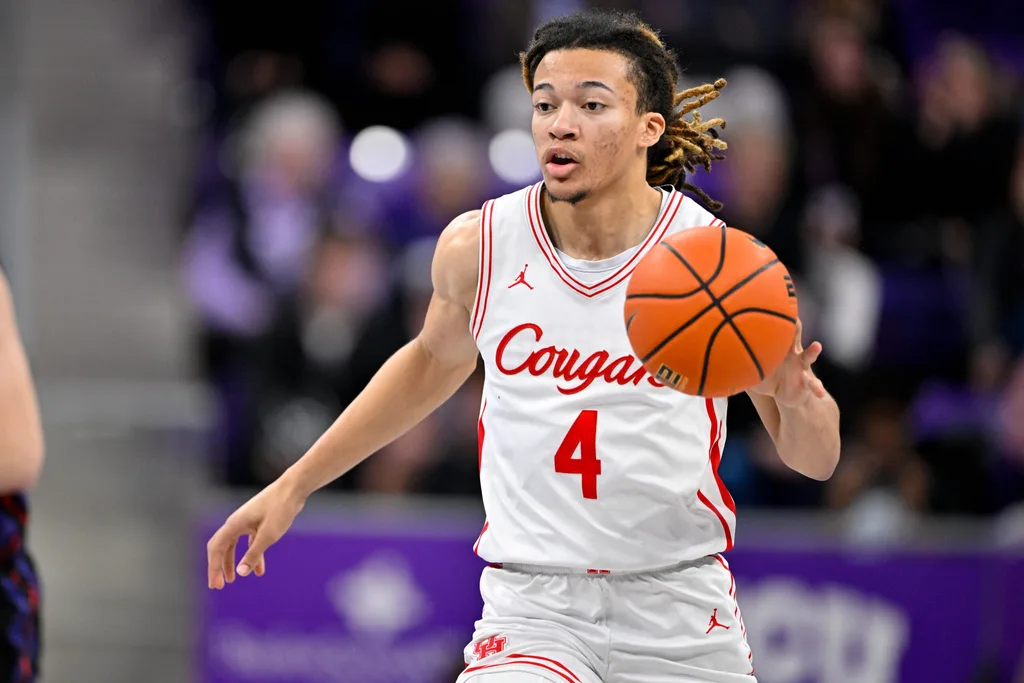 Jan 28, 2026; Fort Worth, Texas, USA; Houston Cougars guard Kingston Flemings (4) brings the ball up court during the game at Ed and Rae Schollmaier Arena. Mandatory Credit: Jerome Miron-Imagn Images