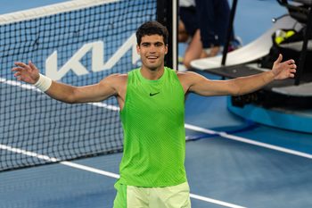 Jan 30, 2026; Melbourne, Victoria, Australia; Carlos Alcaraz of Spain celebrates his victory over Alexander Zverev of Germany in the semifinals of the menís singles at the Australian Open at Rod Laver Arena in Melbourne Park. Mandatory Credit: Mike Frey-Imagn Images