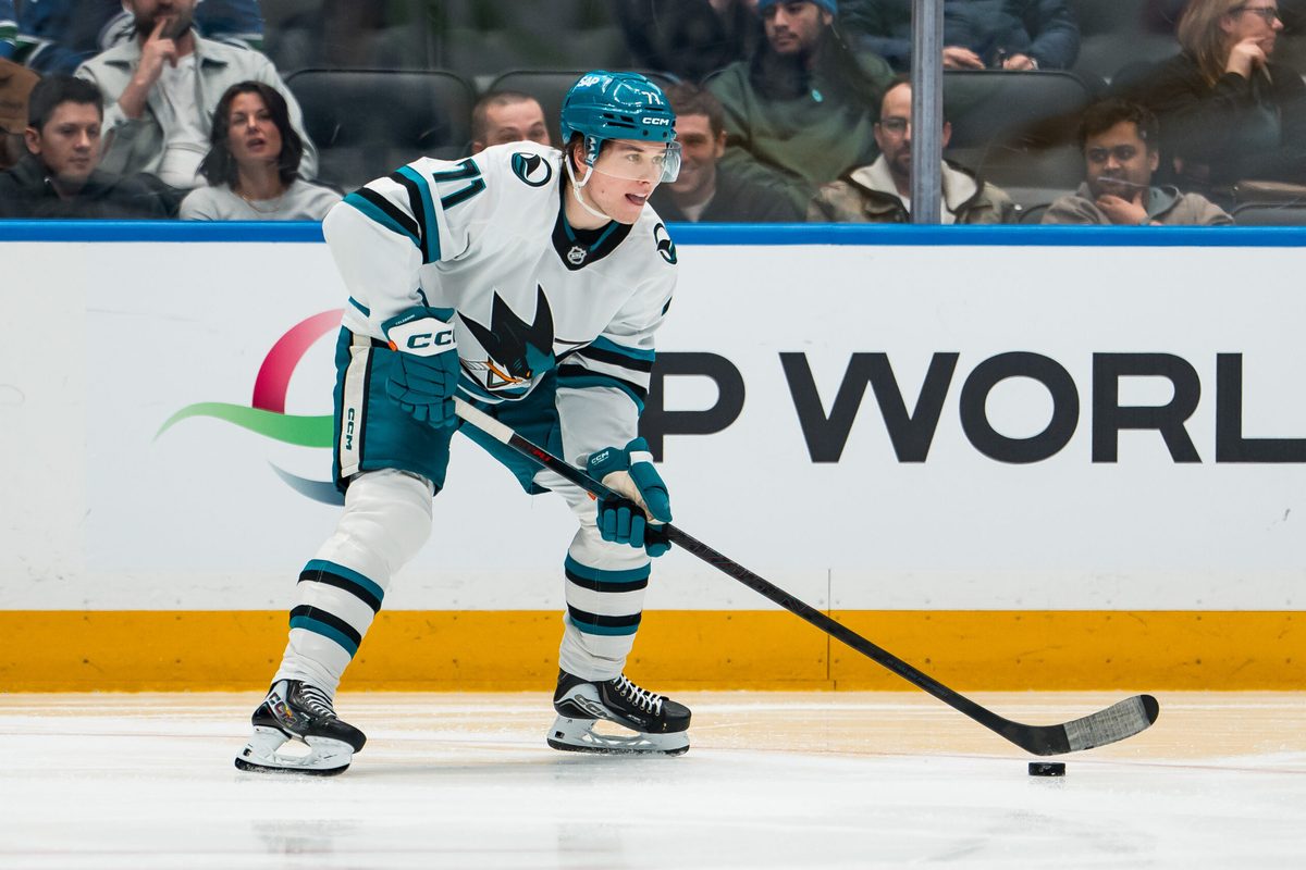 Jan 27, 2026; Vancouver, British Columbia, CAN; San Jose Sharks forward Macklin Celebrini (71) handles the puck against the Vancouver Canucks in the third period at Rogers Arena. Mandatory Credit: Bob Frid-Imagn Images