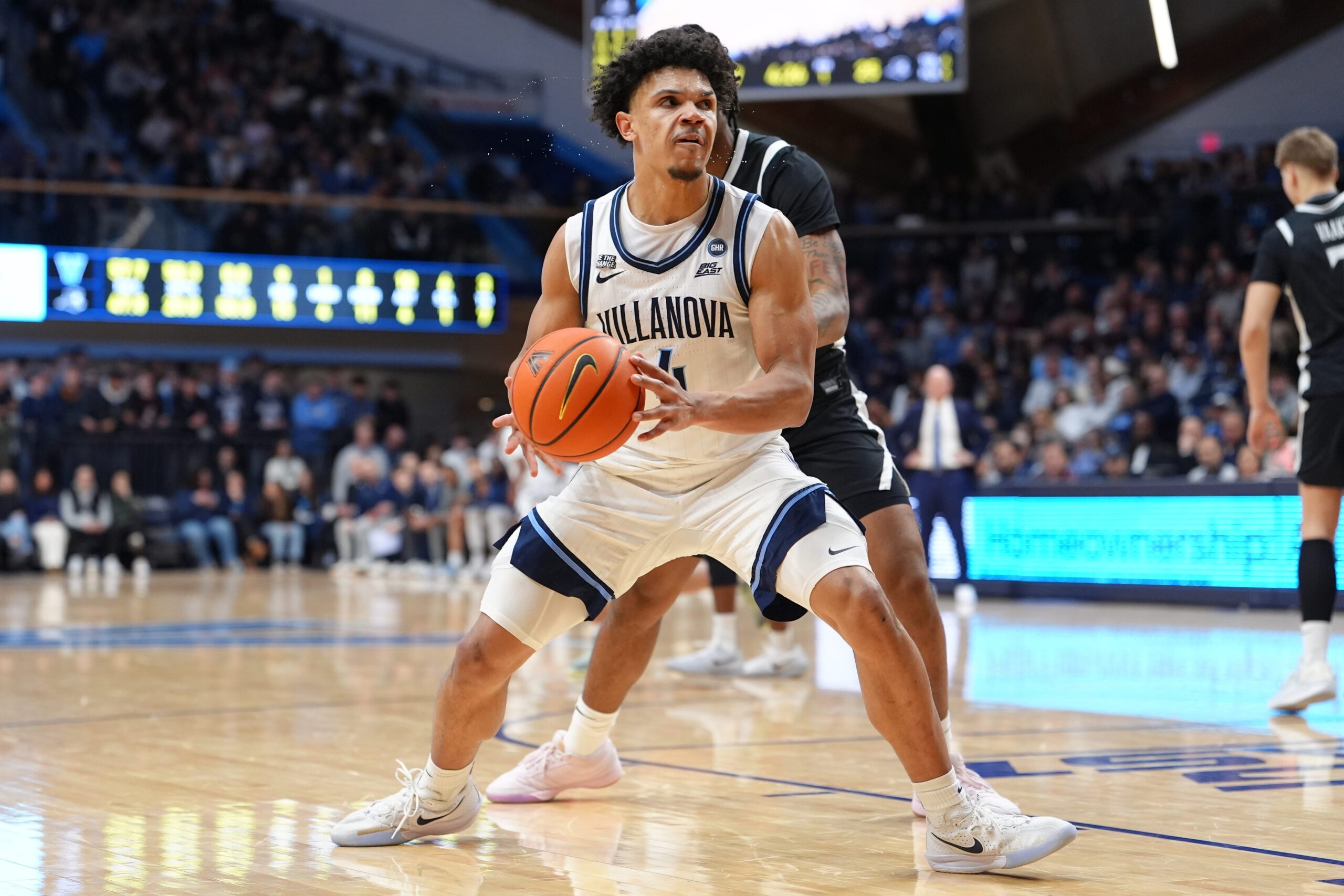 Jan 30, 2026; Villanova, Pennsylvania, USA; Villanova Wildcats guard Tyler Perkins (4) drives with the ball against the Providence Friars in the first half at William B. Finneran Pavilion. Mandatory Credit: Kyle Ross-Imagn Images