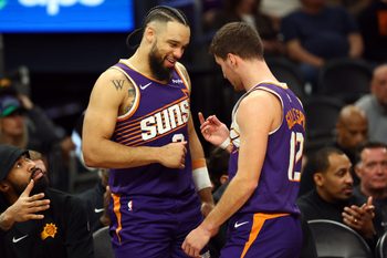 Jan 30, 2026; Phoenix, Arizona, USA; Phoenix Suns forward Dillon Brooks (3) celebrates with guard Collin Gillespie (12) against the Cleveland Cavaliers in the second half at Mortgage Matchup Center. Mandatory Credit: Mark J. Rebilas-Imagn Images
