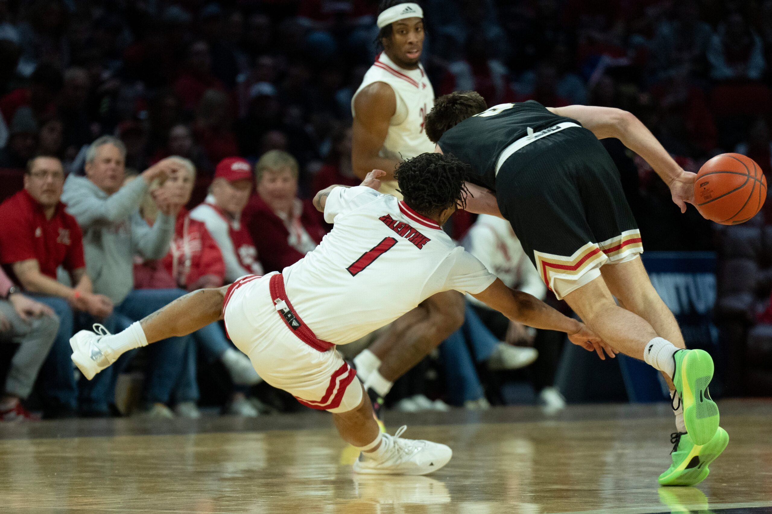 Northern Illinois Huskies guard Makhai Valentine (1) fouls Miami RedHawks guard Peter Suder (5) in the first half of the NCAA Basketball game at Millett Hall in Oxford, Ohio, on Saturday, January 31, 2026.