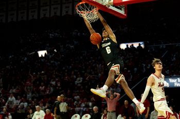 Miami RedHawks guard Justin Kirby (6) dunks on Northern Illinois Huskies forward Gustav Winther (96) defends in the second half of the NCAA Basketball game at Millett Hall in Oxford, Ohio, on Saturday, January 31, 2026.