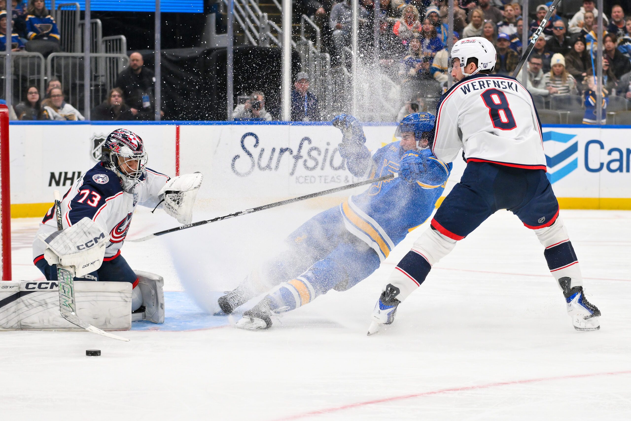 Jan 31, 2026; St. Louis, Missouri, USA; Columbus Blue Jackets goaltender Jet Greaves (73) and defenseman Zach Werenski (8) defend the net against St. Louis Blues right wing Jimmy Snuggerud (21) during the second period at Enterprise Center. Mandatory Credit: Jeff Curry-Imagn Images