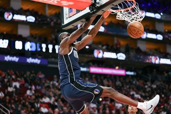 Jan 31, 2026; Houston, Texas, USA; Dallas Mavericks center Moussa Cisse (30) dunks the ball during the third quarter against the Houston Rockets at Toyota Center. Mandatory Credit: Troy Taormina-Imagn Images