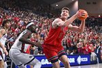 Jan 31, 2026; Spokane, Washington, USA; Saint Mary's Gaels center Harry Wessels (1) shoots the ball against Gonzaga Bulldogs forward Graham Ike (15) in the second half at McCarthey Athletic Center. Gonzaga Bulldogs won 73-65. Mandatory Credit: James Snook-Imagn Images