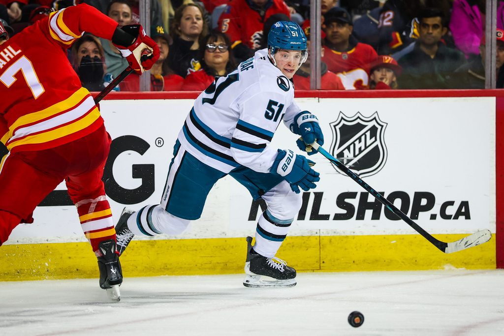 Jan 31, 2026; Calgary, Alberta, CAN; San Jose Sharks right wing Collin Graf (51) skates against the Calgary Flames during the third period at Scotiabank Saddledome. Mandatory Credit: Sergei Belski-Imagn Images