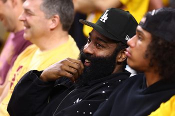 Jan 31, 2026; Tempe, Arizona, USA; Arizona State Sun Devils former player James Harden sits courtside during the game against the Arizona Wildcats in the second half at Desert Financial Arena. Mandatory Credit: Mark J. Rebilas-Imagn Images