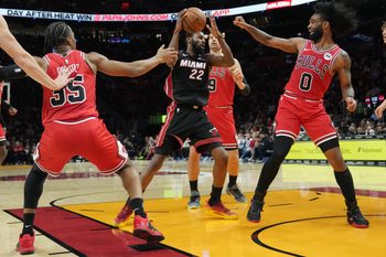Feb 1, 2026; Miami, Florida, USA;  Miami Heat forward Andrew Wiggins (22) grabs a rebound against the Chicago Bulls during the second half at Kaseya Center. Mandatory Credit: Jim Rassol-Imagn Images