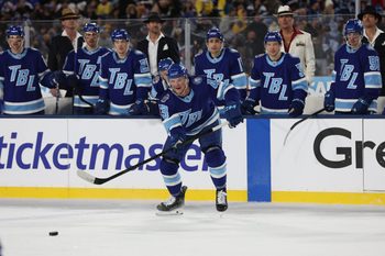 Feb 1, 2026; Tampa Bay, Florida, USA; Tampa Bay Lightning defenseman Darren Raddysh (43) looks to controls the loose puck against the Boston Bruins during the second period in the 2026 Stadium Series ice hockey game at Raymond James Stadium. Mandatory Credit: Kim Klement Neitzel-Imagn Images