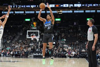Feb 1, 2026; San Antonio, Texas, USA;  Orlando Magic guard Jett Howard (13) shoots in the second half against the San Antonio Spurs at Frost Bank Center. Mandatory Credit: Daniel Dunn-Imagn Images