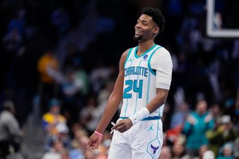 Feb 2, 2026; Charlotte, North Carolina, USA;  Charlotte Hornets forward Brandon Miller (24) smiles in the final seconds of the come from behind win against the New Orleans Pelicans during the second half at the Spectrum Center. Mandatory Credit: Jim Dedmon-Imagn Images