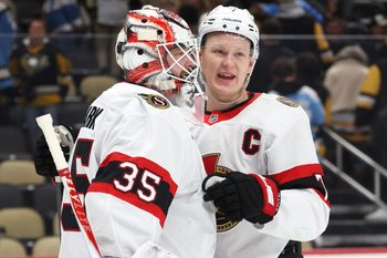 Feb 2, 2026; Pittsburgh, Pennsylvania, USA;  Ottawa Senators goaltender Linus Ullmark (35) and left wing Brady Tkachuk (7) celebrate a victory over the Pittsburgh Penguins at PPG Paints Arena. Mandatory Credit: Charles LeClaire-Imagn Images