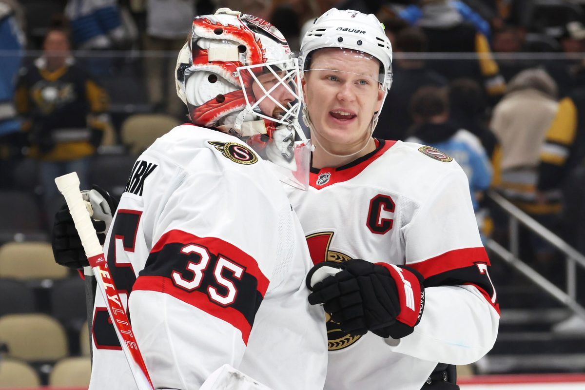 Feb 2, 2026; Pittsburgh, Pennsylvania, USA; Ottawa Senators goaltender Linus Ullmark (35) and left wing Brady Tkachuk (7) celebrate a victory over the Pittsburgh Penguins at PPG Paints Arena. Mandatory Credit: Charles LeClaire-Imagn Images