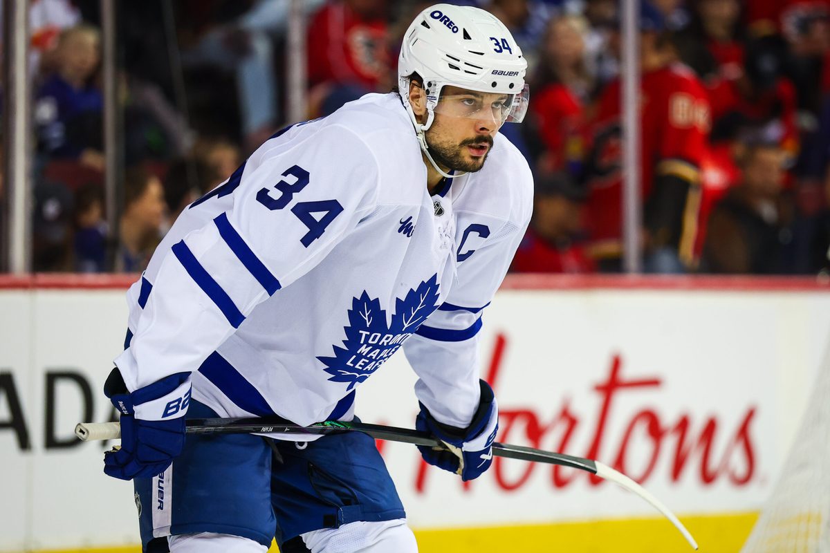 Feb 2, 2026; Calgary, Alberta, CAN; Toronto Maple Leafs center Auston Matthews (34) against the Calgary Flames during the second period at Scotiabank Saddledome. Mandatory Credit: Sergei Belski-Imagn Images