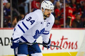 Feb 2, 2026; Calgary, Alberta, CAN; Toronto Maple Leafs center Auston Matthews (34) against the Calgary Flames during the second period at Scotiabank Saddledome. Mandatory Credit: Sergei Belski-Imagn Images