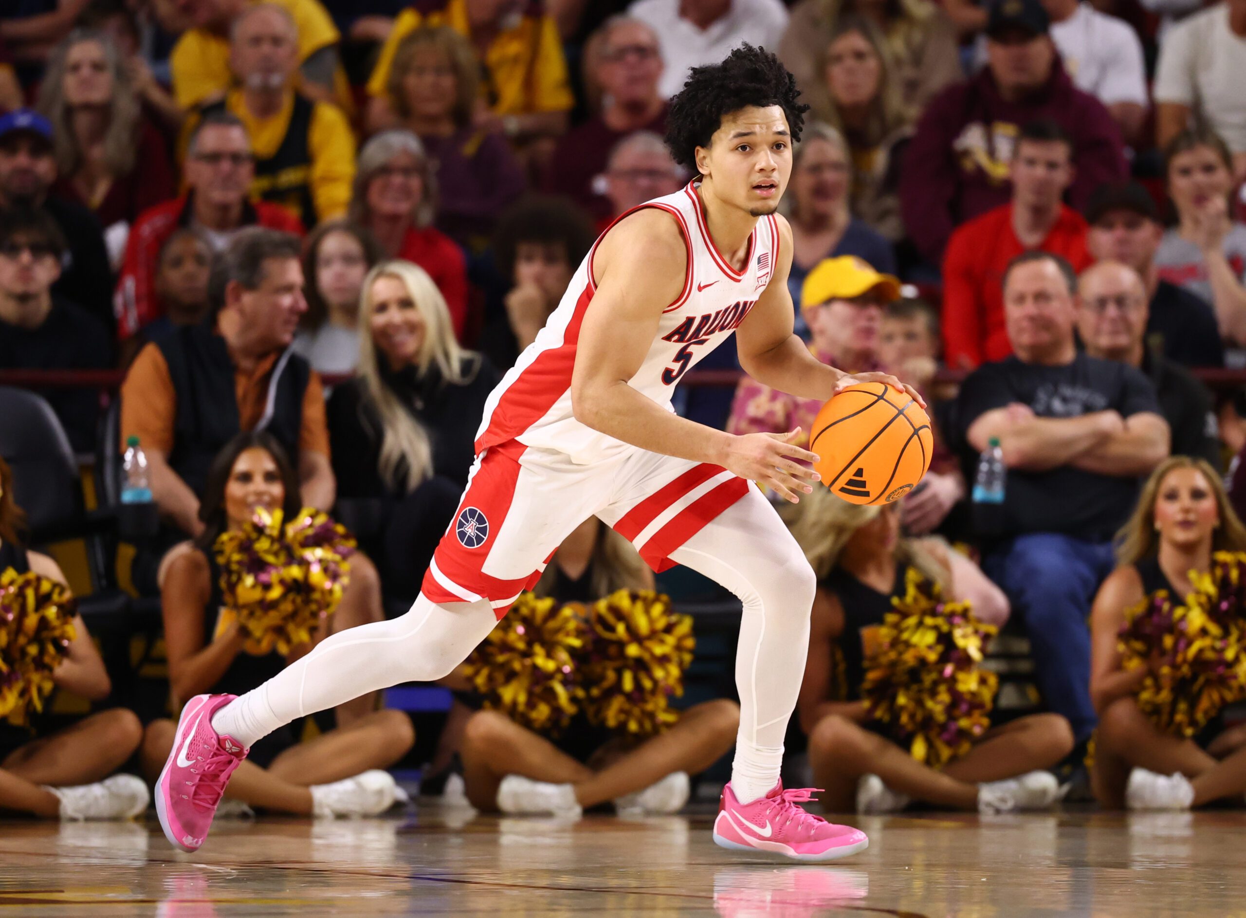 Jan 31, 2026; Tempe, Arizona, USA; Arizona Wildcats guard Brayden Burries (5) against the Arizona State Sun Devils at Desert Financial Arena. Mandatory Credit: Mark J. Rebilas-Imagn Images