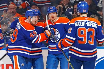 Feb 3, 2026; Edmonton, Alberta, CAN; The Edmonton Oilers celebrate a goal scored by forward Kasperi Kapanen (42) during the third period against the Toronto Maple Leafs at Rogers Place. Mandatory Credit: Perry Nelson-Imagn Images
