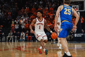 Feb 3, 2026; Charlottesville, Virginia, USA; Virginia Cavaliers guard Malik Thomas (1) brings the ball up court in the second half against the Pittsburgh Panthers at John Paul Jones Arena. Mandatory Credit: Emily Faith Morgan-Imagn Images