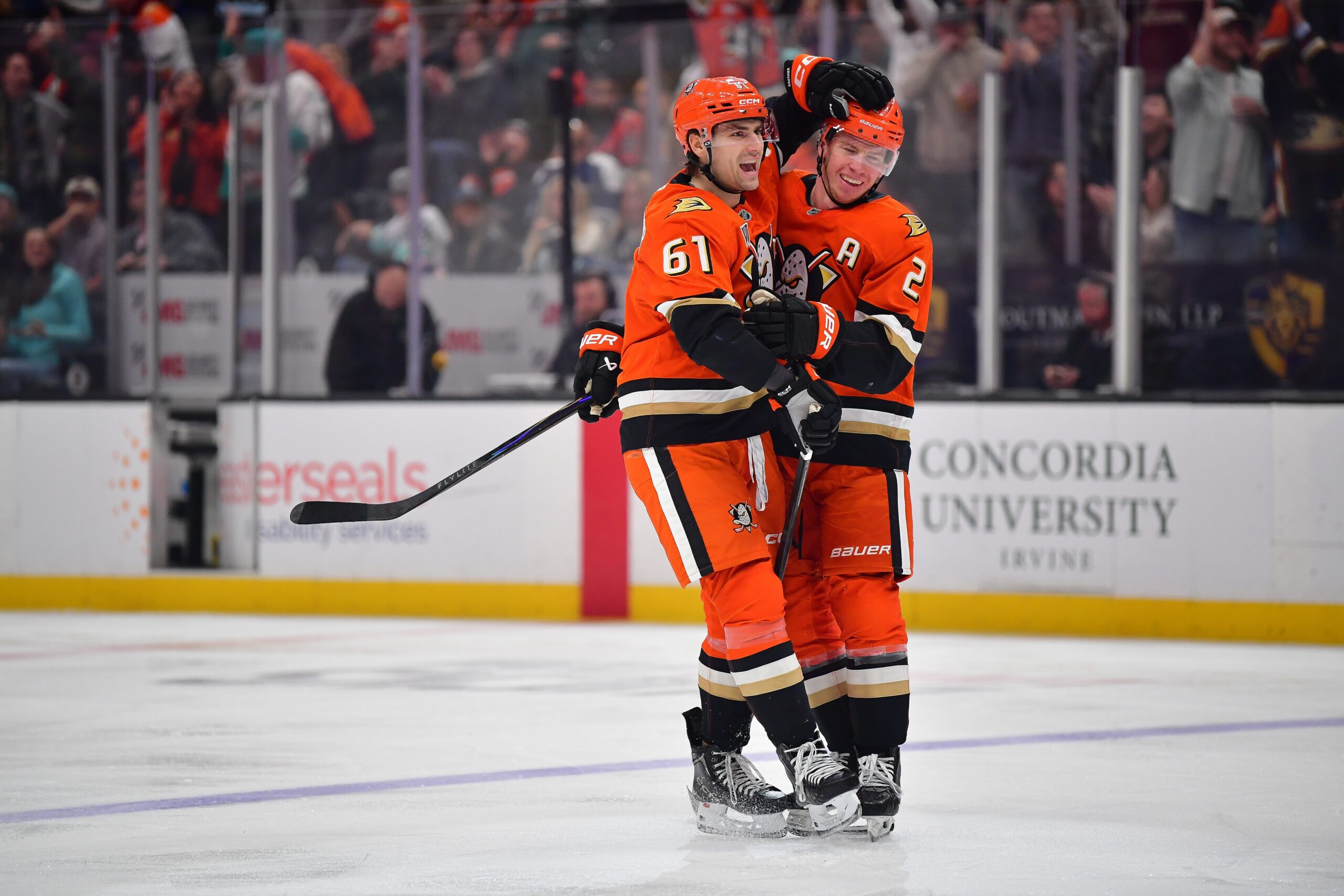 Feb 3, 2026; Anaheim, California, USA; Anaheim Ducks left wing Cutter Gauthier (61) celebrates his goal scored against the Seattle Kraken with defenseman Jackson LaCombe (2) during the second period at Honda Center. Mandatory Credit: Gary A. Vasquez-Imagn Images