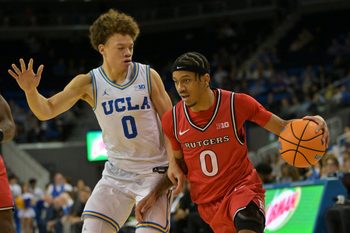 Feb 3, 2026; Los Angeles, California, USA; Rutgers Scarlet Knights guard Tariq Francis (0) is defended by UCLA Bruins guard Trent Perry (0) in the second half at Pauley Pavilion presented by Wescom Financial. Mandatory Credit: Jayne Kamin-Oncea-Imagn Images