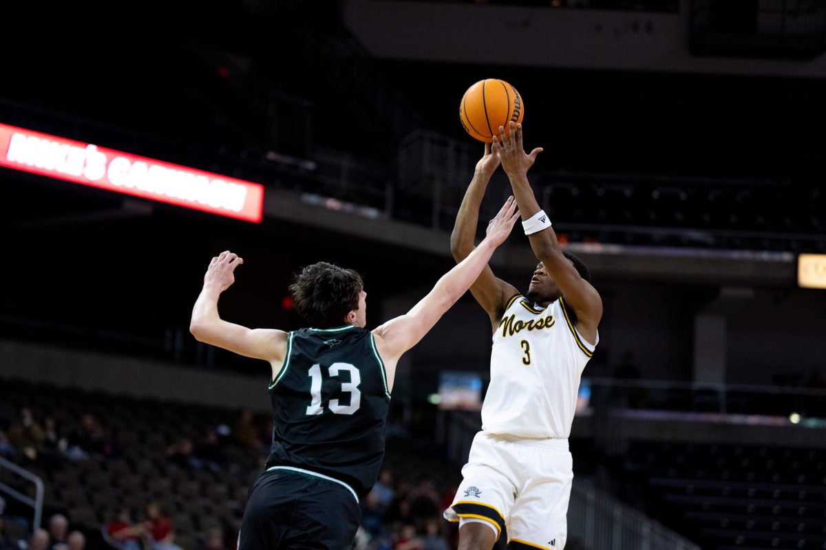 NKU Norse guard Shawn Nelson (3) hits a basket over Green Bay Phoenix forward Marcus Hall (13) in the second half of the NCAA basketball game at Truist Arena in Highland Heights, Ky., on Wednesday, Feb. 4, 2026.