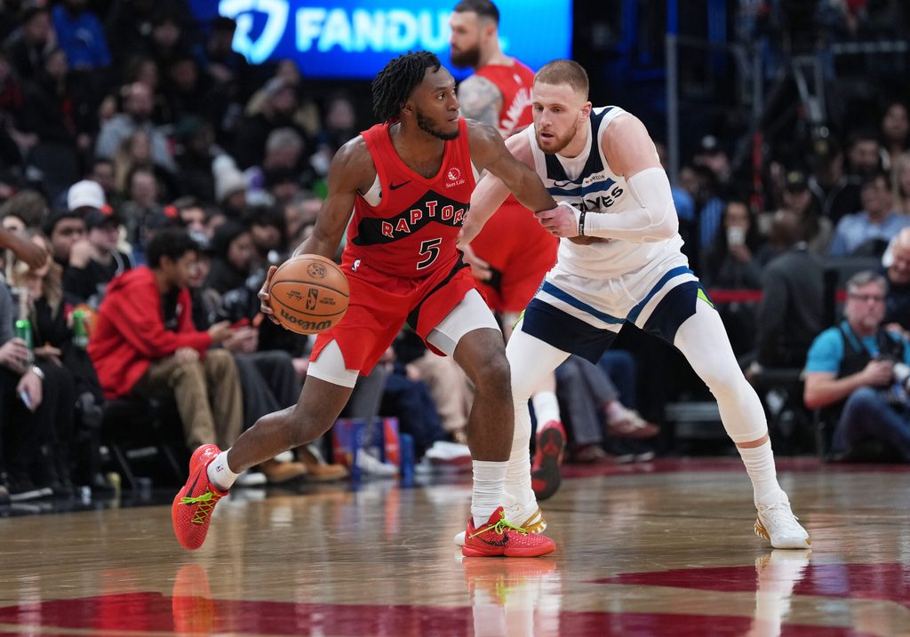 Feb 4, 2026; Toronto, Ontario, CAN; Toronto Raptors guard Immanuel Quickley (5) dribbles against Minnesota Timberwolves guard Donte DiVincenzo (0) during the fourth quarter at Scotiabank Arena. Mandatory Credit: Nick Turchiaro-Imagn Images