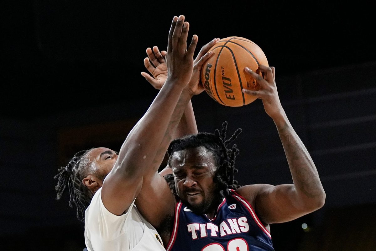 Milwaukee Panthers guard Aaron Franklin (29) attempts to block Detroit Mercy Titans forward London Maiden (20) during the first half of the game on Wednesday February 4, 2026 at the UW-Milwaukee Panther Arena in Milwaukee, Wisconsin.