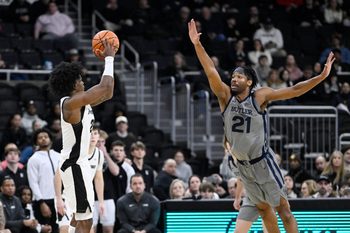 Feb 4, 2026; Providence, Rhode Island, USA; Providence Friars guard Jaylin Sellers (2) shoots for three points against Butler Bulldogs forward Yohan Traore (21) during the second half at Amica Mutual Pavilion. Mandatory Credit: Eric Canha-Imagn Images