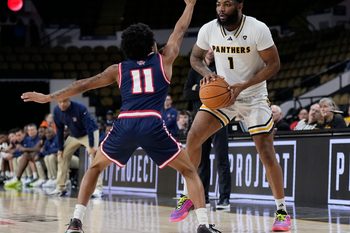 Detroit Mercy Titans guard Lance Stone (11) guards Milwaukee Panthers guard Amar Augillard (1) during the second half of the game on Wednesday February 4, 2026 at the UW-Milwaukee Panther Arena in Milwaukee, Wisconsin.