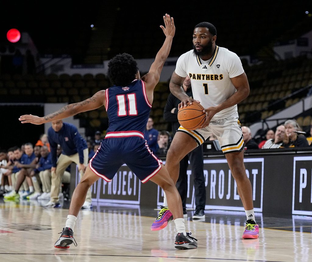 Detroit Mercy Titans guard Lance Stone (11) guards Milwaukee Panthers guard Amar Augillard (1) during the second half of the game on Wednesday February 4, 2026 at the UW-Milwaukee Panther Arena in Milwaukee, Wisconsin.