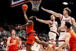 Feb 4, 2026; Stanford, California, USA;  Clemson Tigers guard Jestin Porter (1) shoots against Stanford Cardinal guard Jeremy Dent-Smith (25) during the second half at Maples Pavilion. Mandatory Credit: John Hefti-Imagn Images