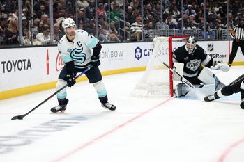 Feb 4, 2026; Los Angeles, California, USA;  Seattle Kraken right wing Jordan Eberle (7) controls the puck as Los Angeles Kings goaltender Darcy Kuemper (35) defends the goal during the third period at Crypto.com Arena. Mandatory Credit: Kiyoshi Mio-Imagn Images