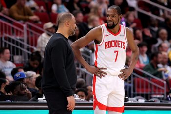 Feb 5, 2026; Houston, Texas, USA; Houston Rockets head coach Ime Udoka talks with Houston Rockets forward Kevin Durant (7) against the Charlotte Hornets during the third quarter at Toyota Center. Mandatory Credit: Erik Williams-Imagn Images