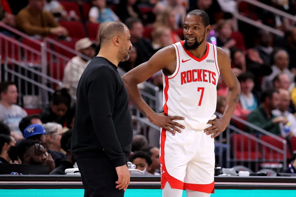 Feb 5, 2026; Houston, Texas, USA; Houston Rockets head coach Ime Udoka talks with Houston Rockets forward Kevin Durant (7) against the Charlotte Hornets during the third quarter at Toyota Center. Mandatory Credit: Erik Williams-Imagn Images