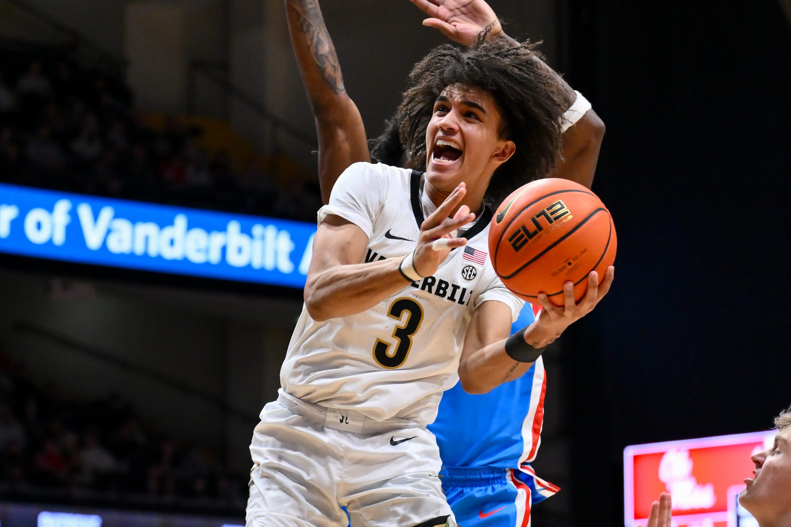 Jan 31, 2026; Nashville, TN, USA;  Vanderbilt Commodores guard Tyler Tanner (3) shoots the ball over Mississippi Rebels guard AJ Storr (2) during the second half at Memorial Gymnasium. Mandatory Credit: Steve Roberts-Imagn Images