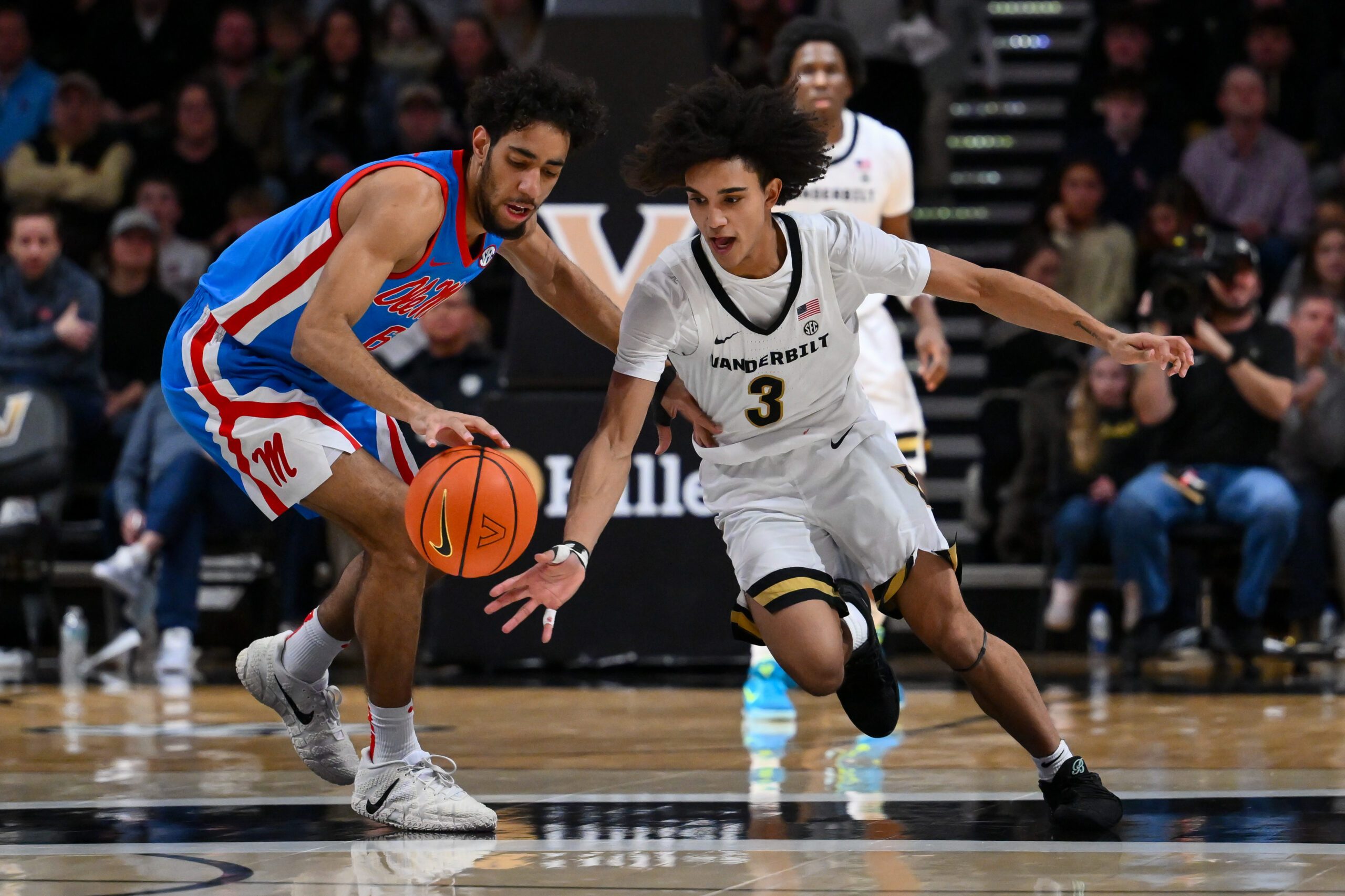 Jan 31, 2026; Nashville, TN, USA;  Vanderbilt Commodores guard Tyler Tanner (3) steals the ball from Mississippi Rebels guard Ilias Kamardine (6) during the second half at Memorial Gymnasium. Mandatory Credit: Steve Roberts-Imagn Images