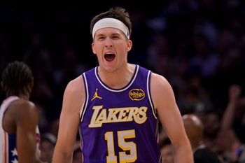 Feb 5, 2026; Los Angeles, California, USA;  Los Angeles Lakers guard Austin Reaves (15) reacts at the buzzer defeating the Philadelphia 76ers at Crypto.com Arena. Mandatory Credit: Jayne Kamin-Oncea-Imagn Images