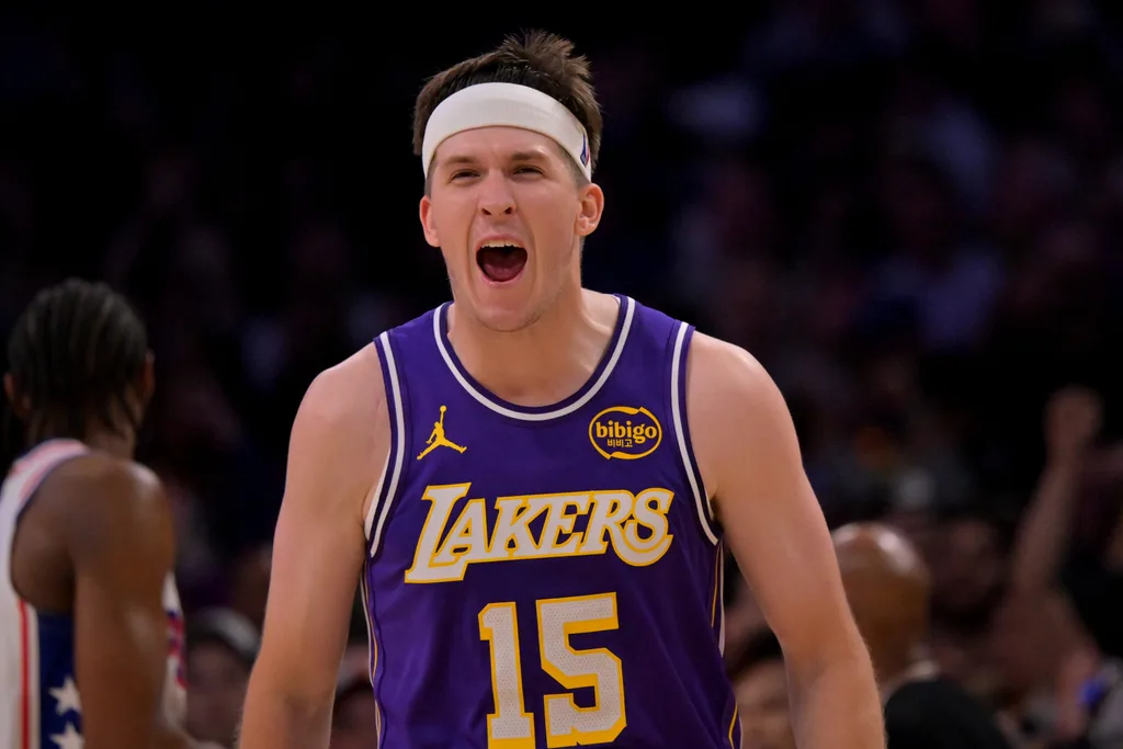 Feb 5, 2026; Los Angeles, California, USA; Los Angeles Lakers guard Austin Reaves (15) reacts at the buzzer defeating the Philadelphia 76ers at Crypto.com Arena. Mandatory Credit: Jayne Kamin-Oncea-Imagn Images