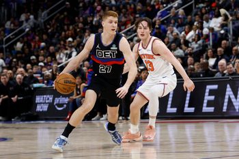 Feb 6, 2026; Detroit, Michigan, USA;  Detroit Pistons guard Kevin Huerter (27) dribbles on New York Knicks guard Tyler Kolek (13) in the second half at Little Caesars Arena. Mandatory Credit: Rick Osentoski-Imagn Images