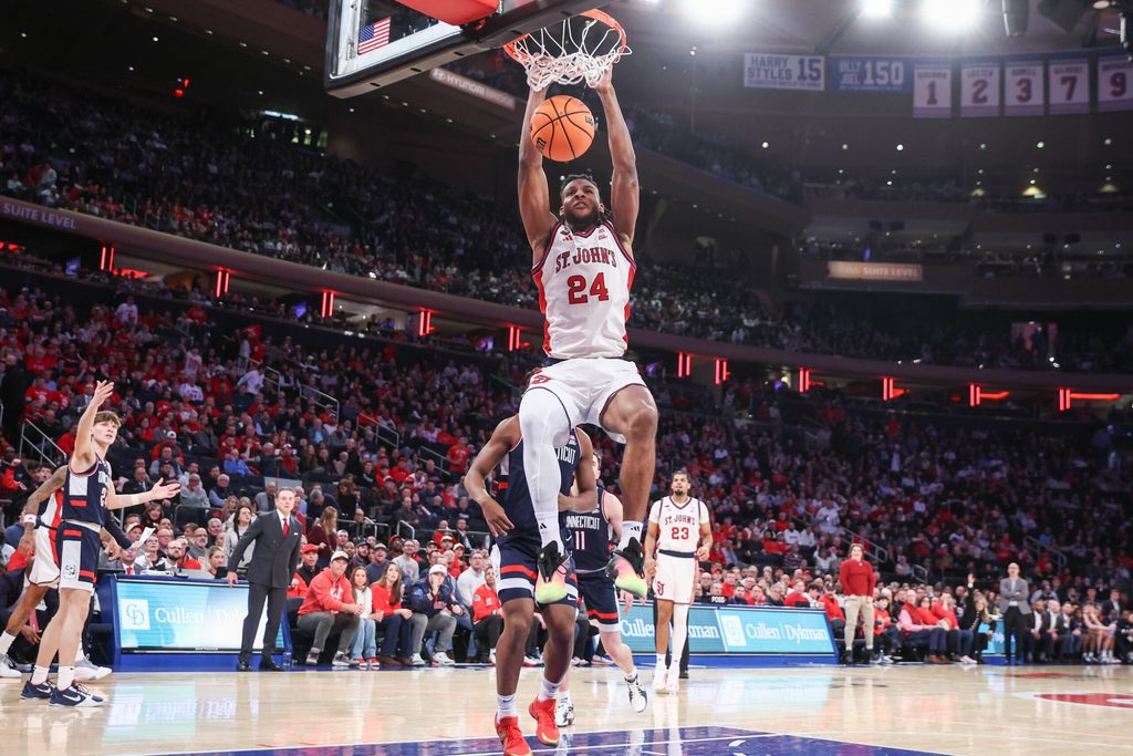 Feb 6, 2026; New York, New York, USA; St. John's Red Storm forward Zuby Ejiofor (24) dunks in the second half against the UConn Huskies at Madison Square Garden. Mandatory Credit: Wendell Cruz-Imagn Images