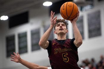 Windsor's Madden Smiley goes up for a basket during a league rivalry high school basketball doubleheader vs. Fossil Ridge on Feb. 6, 2026 at Fossil Ridge High School in Fort Collins, Colo.